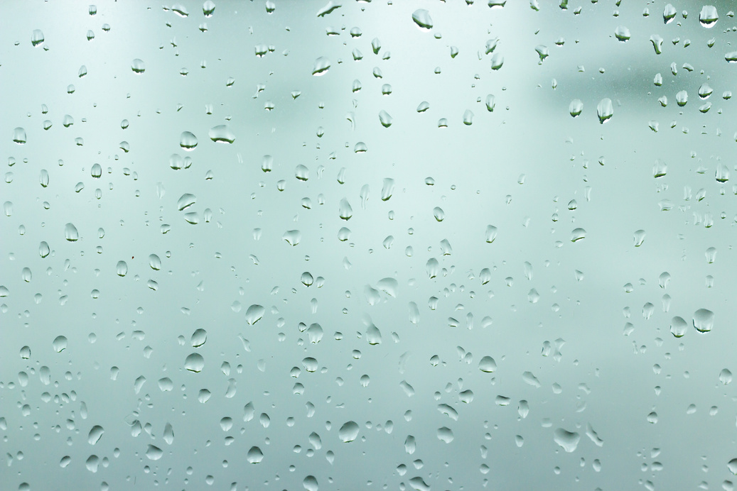 Glass Window with Water Droplets 